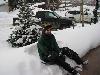 Reid sitting in snow